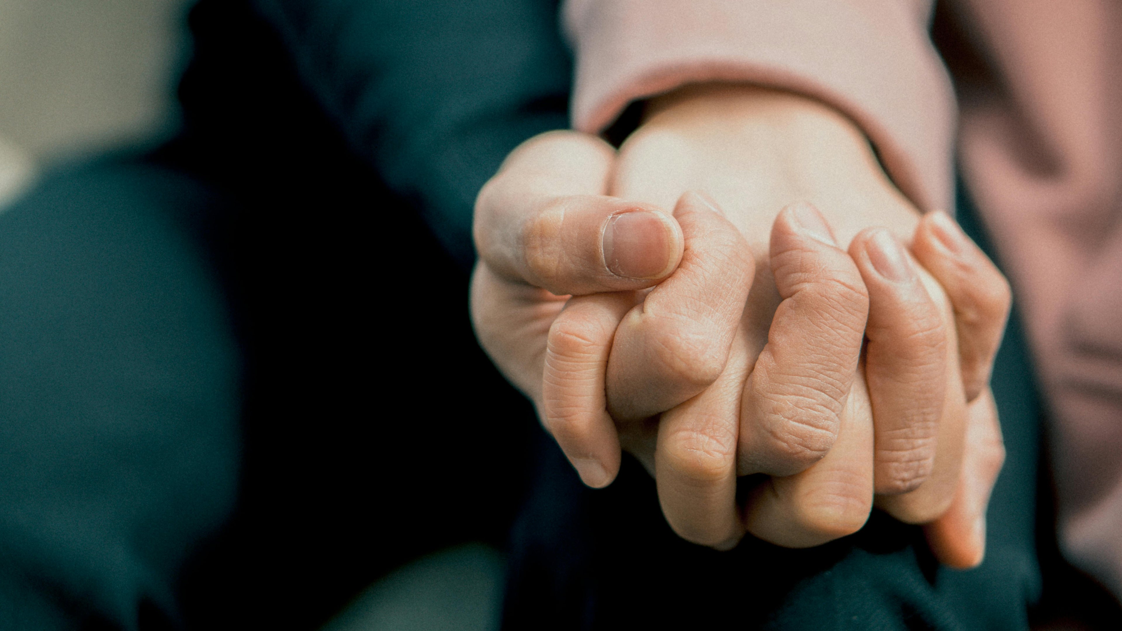 guy and girl holding hands